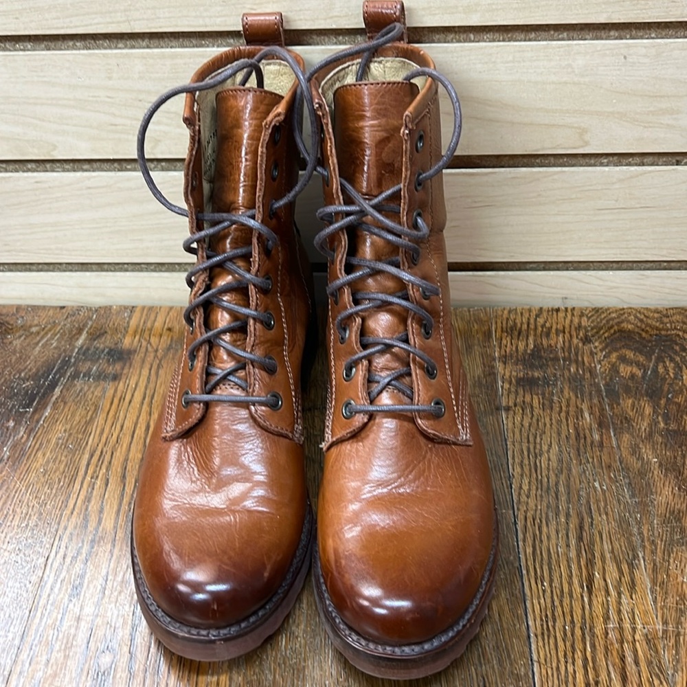 Tannish brown leather Frye boots, lace front, like new.